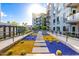 Beautiful courtyard with desert landscaping, walkway, and building views at 3131 N Central Ave # 6010, Phoenix, AZ 85012