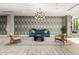 Comfortable lounge area with stylish decor, accent chairs, and a contemporary sofa, ideal for relaxation and socializing at 3131 N Central Ave # 6010, Phoenix, AZ 85012