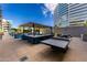 Resort-style outdoor kitchen with grills, ping pong, ample seating, and city views at 3131 N Central Ave # 6010, Phoenix, AZ 85012