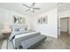 Serene bedroom featuring a comfortable bed, stylish decor, and ample natural light at 32017 N Redding St, Wittmann, AZ 85361