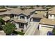 Aerial view of a two-story home with a tile roof, showing the property's layout and neighborhood surroundings at 3330 E Carla Vista Dr, Gilbert, AZ 85295