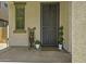 Inviting covered porch with decorative accents, enhancing the entrance with charm and style at 3330 E Carla Vista Dr, Gilbert, AZ 85295