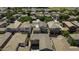 Aerial view showcasing the neighborhood's layout, houses, and manicured landscaping at 3330 E Carla Vista Dr, Gilbert, AZ 85295