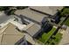 Aerial view of the rear exterior of the house with a manicured lawn and patio at 3330 E Carla Vista Dr, Gilbert, AZ 85295