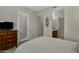 Relaxing bedroom with neutral tones and a view to the bathroom, closet, and balcony at 3330 S Gilbert Rd # 2021, Chandler, AZ 85286