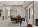 Neutral dining room featuring modern chandelier, dining table, sliding glass doors, and carpeted floor at 3330 S Gilbert Rd # 2021, Chandler, AZ 85286