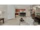 Open-concept living space with kitchen view, stylish seating, and neutral color scheme at 3330 S Gilbert Rd # 2021, Chandler, AZ 85286