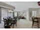 Open-concept living and dining area with lots of natural light and neutral décor throughout at 3330 S Gilbert Rd # 2021, Chandler, AZ 85286
