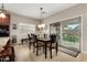 Cozy dining area with table, chairs, and sliding doors that lead to the backyard at 4089 E Peach Tree Dr, Chandler, AZ 85249