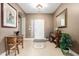 Inviting foyer with tiled floor, front door view, neutral walls, and classic decor at 4089 E Peach Tree Dr, Chandler, AZ 85249