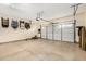 Spacious two-car garage with ample storage space and a clean, well-maintained concrete floor at 4089 E Peach Tree Dr, Chandler, AZ 85249