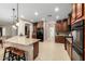 Bright and airy kitchen offering a large island with bar seating and ample storage space at 4089 E Peach Tree Dr, Chandler, AZ 85249