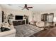 Comfortable living room with neutral color scheme, tile flooring, and ample seating at 4089 E Peach Tree Dr, Chandler, AZ 85249