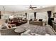 Spacious living room is complete with nice furnishings, natural light, and a ceiling fan at 4089 E Peach Tree Dr, Chandler, AZ 85249