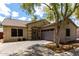 Charming home with manicured lawn and a two-car garage at 4109 E Chambers St, Phoenix, AZ 85040