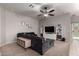 Inviting living room with a comfortable sectional sofa, neutral decor, and modern entertainment center at 4109 E Chambers St, Phoenix, AZ 85040