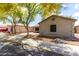 Street view of several homes with well-kept yards and desert landscaping at 4109 E Chambers St, Phoenix, AZ 85040
