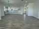 Open-concept home featuring a modern kitchen with subway tile and light countertops at 4116 E Park St, Phoenix, AZ 85042