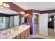 Large bathroom featuring a double vanity and separate shower and soaking tub at 4138 N 298Th Ln, Buckeye, AZ 85396