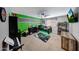Spacious bedroom with an race car theme, including a bed, desk, and TV at 4138 N 298Th Ln, Buckeye, AZ 85396