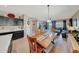 Open-concept layout showcasing a kitchen, dining area, and a glimpse of the living space at 4138 N 298Th Ln, Buckeye, AZ 85396
