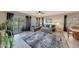 Cozy living room with modern decor, sliding glass doors to backyard, and ample seating at 4138 N 298Th Ln, Buckeye, AZ 85396