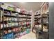 Walk-in pantry with organized shelving and ample storage for food and kitchen essentials at 4138 N 298Th Ln, Buckeye, AZ 85396