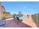 Inviting backyard pool area with lounge chairs and covered patio at 4138 N 298Th Ln, Buckeye, AZ 85396