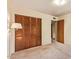 Bedroom with closet and easy access to hallway at 4232 W Purdue Ave, Phoenix, AZ 85051