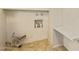 Functional laundry room including countertop, hookups, and tile flooring at 4232 W Purdue Ave, Phoenix, AZ 85051