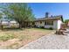A spacious and well-maintained backyard featuring a patio area at 4402 N 79Th Dr, Phoenix, AZ 85033