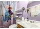 bathroom, charming decor and a single sink vanity at 4402 N 79Th Dr, Phoenix, AZ 85033