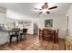 Bright kitchen adjacent to dining room, bar stool seating at 4402 N 79Th Dr, Phoenix, AZ 85033