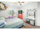 Bedroom with a dresser, vanity, window with blinds, and a ceiling fan at 44355 W Oster Dr, Maricopa, AZ 85138
