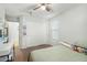 Bedroom with a closet, window with blinds, and a ceiling fan at 44355 W Oster Dr, Maricopa, AZ 85138