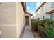 View of the entryway with a private walkway and desert landscaping at 44355 W Oster Dr, Maricopa, AZ 85138