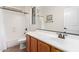 Well-lit bathroom featuring a tub with shower, large mirror, and white sink at 4495 E Woodside Way, Gilbert, AZ 85297
