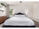 Spacious bedroom featuring a large bed, neutral walls, and dresser at 4495 E Woodside Way, Gilbert, AZ 85297