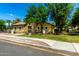 Community clubhouse featuring desert landscaping, a tile roof, and neutral exterior paint at 4495 E Woodside Way, Gilbert, AZ 85297