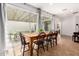 Bright dining area with a large window view of the covered patio and backyard at 4495 E Woodside Way, Gilbert, AZ 85297