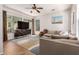 Inviting living room with comfortable seating, ample natural light, and stylish decor at 4495 E Woodside Way, Gilbert, AZ 85297