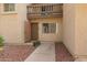 Exterior view of the home showcasing the front door and landscape at 520 N Stapley Dr # 181, Mesa, AZ 85203