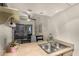 Efficient kitchen features a stainless steel sink and a view of the outdoor patio, blending indoor and outdoor spaces at 520 N Stapley Dr # 181, Mesa, AZ 85203