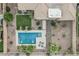 Aerial view showcasing the backyard swimming pool, patio, desert landscaping, and private backyard at 582 W Stirrup Ln, San Tan Valley, AZ 85143
