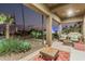 Back patio leading to a beautiful pool at 582 W Stirrup Ln, San Tan Valley, AZ 85143