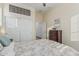 Bedroom with a comfortable bed, closet, and wood dresser at 582 W Stirrup Ln, San Tan Valley, AZ 85143