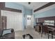 Comfortable office with nice brown leather furniture at 582 W Stirrup Ln, San Tan Valley, AZ 85143