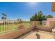Balcony with views of green space and palm trees at 5953 W Aurora Dr, Glendale, AZ 85308