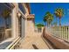 Balcony with sliding glass door and wrought iron railing with palm tree views at 5953 W Aurora Dr, Glendale, AZ 85308