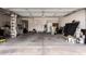 Spacious garage with ample storage and room for multiple vehicles at 5953 W Aurora Dr, Glendale, AZ 85308